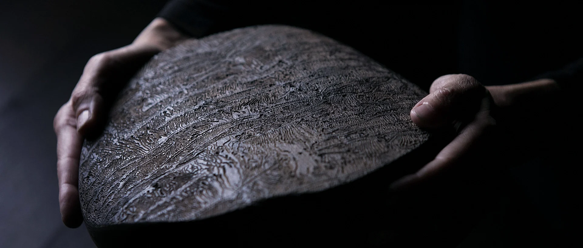 Natural artisanal handcrafted platter with traces of worms